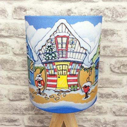 five colourful beach huts in the snow lampshade